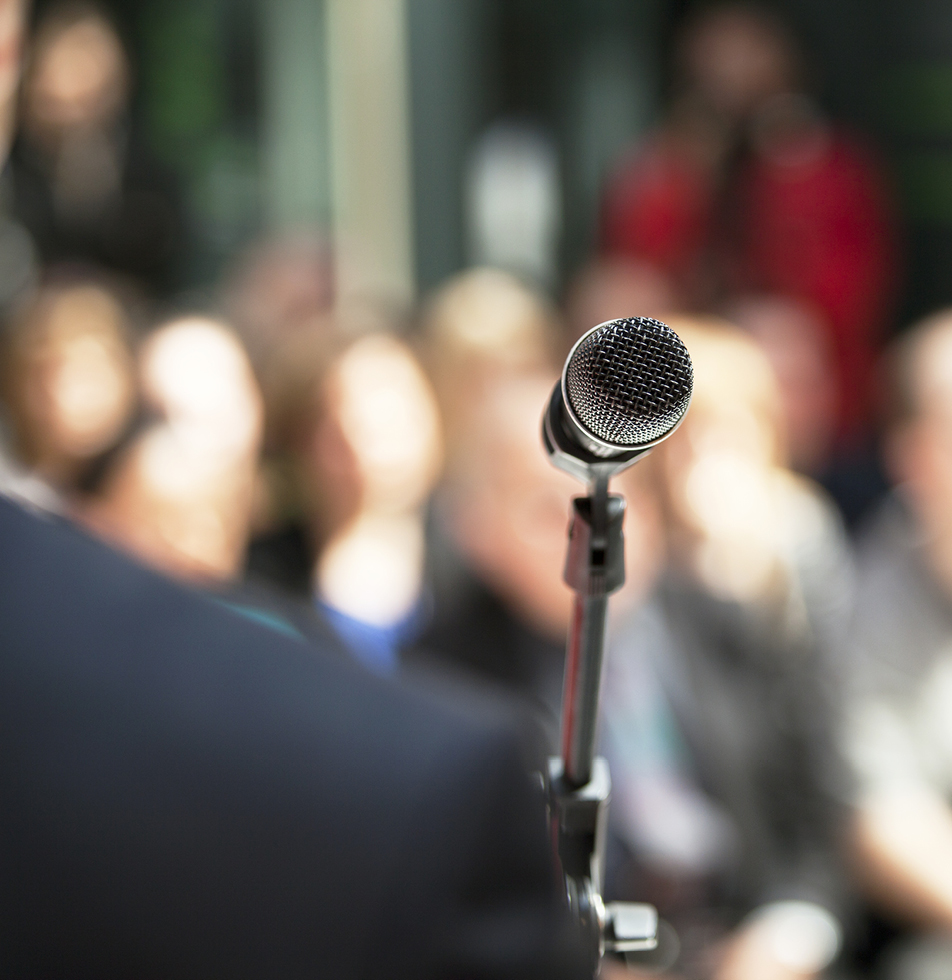 Person speaking at the microphone